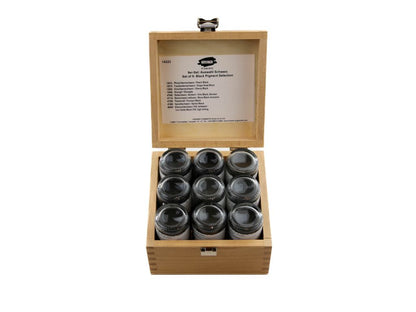 Wooden box with six glass jars on a white background