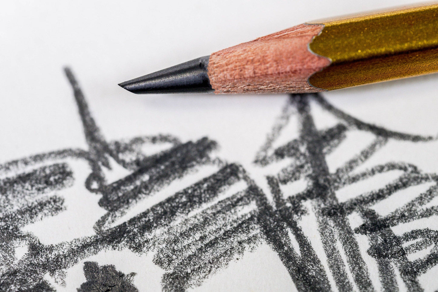 Pencil with a drawing on a white background