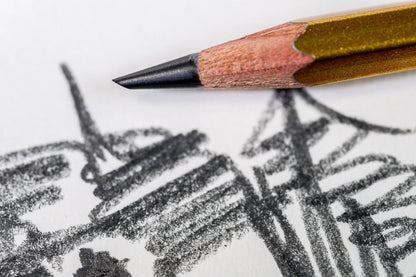 Pencil with a drawing on a white background