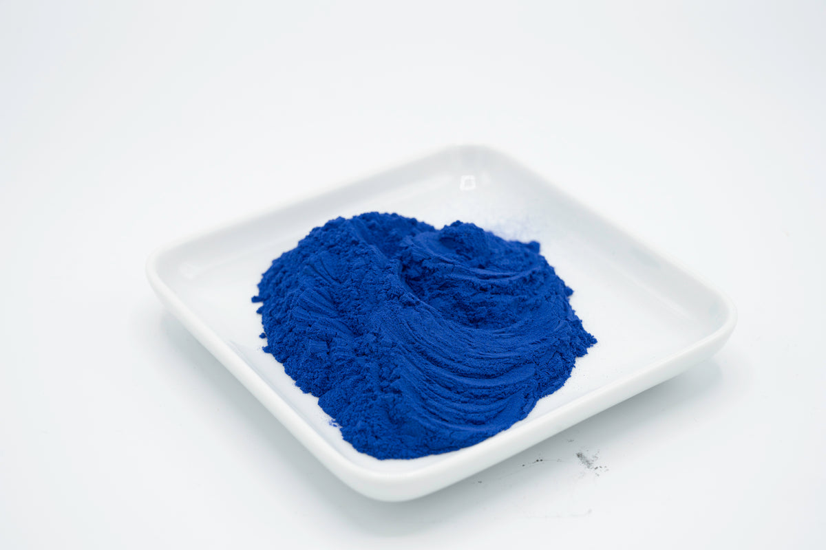 blue powdered pigment on a plate